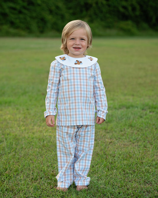 A Boy Wearing Blue And Brown Check Embroidered Turkeys Pant Set