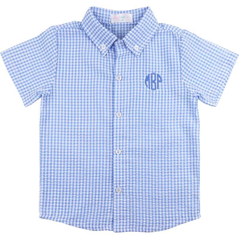 Blue checkered shirt with a monogram on a white background