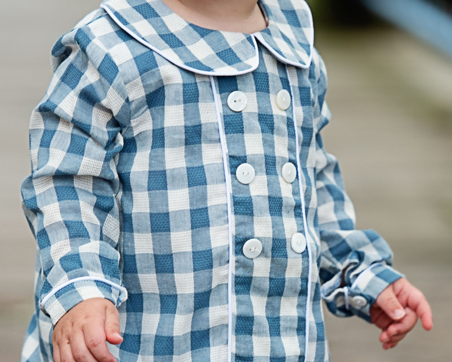 Blue and white checkered bubble with buttons on a blurred background