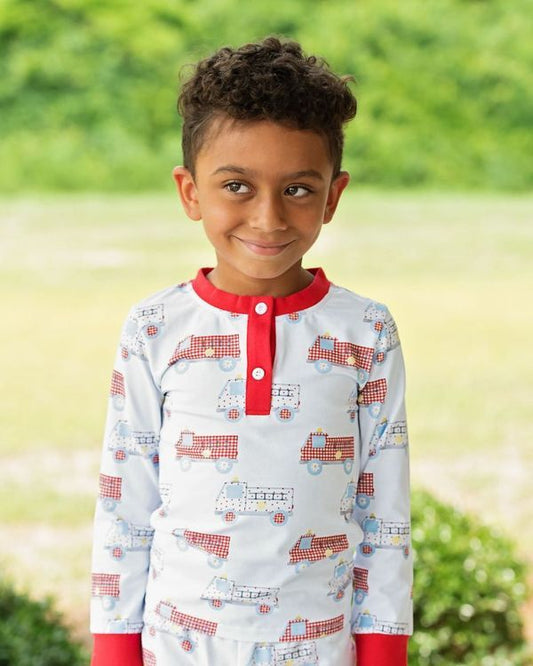 Boy wearing Firetruck Knit Pajamas