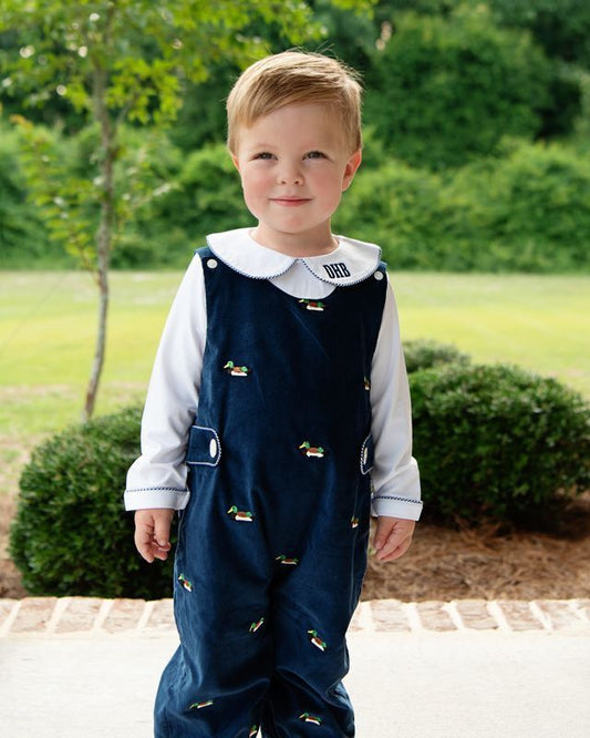 Boy wearing Navy Corduroy Embroidered Mallards Long Romper Set