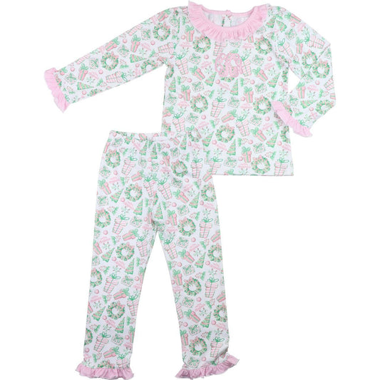Children's pajama set with festive holiday pattern on a white background