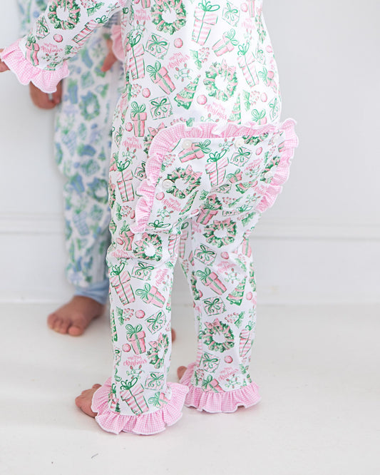 Children's pajama set with festive pattern on a white background