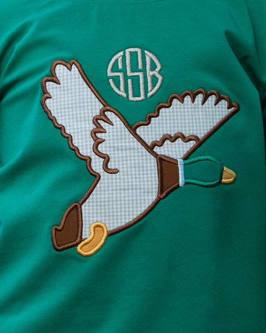 Close up of Boy wearing Green And Khaki Gingham Applique Mallard Pant Set