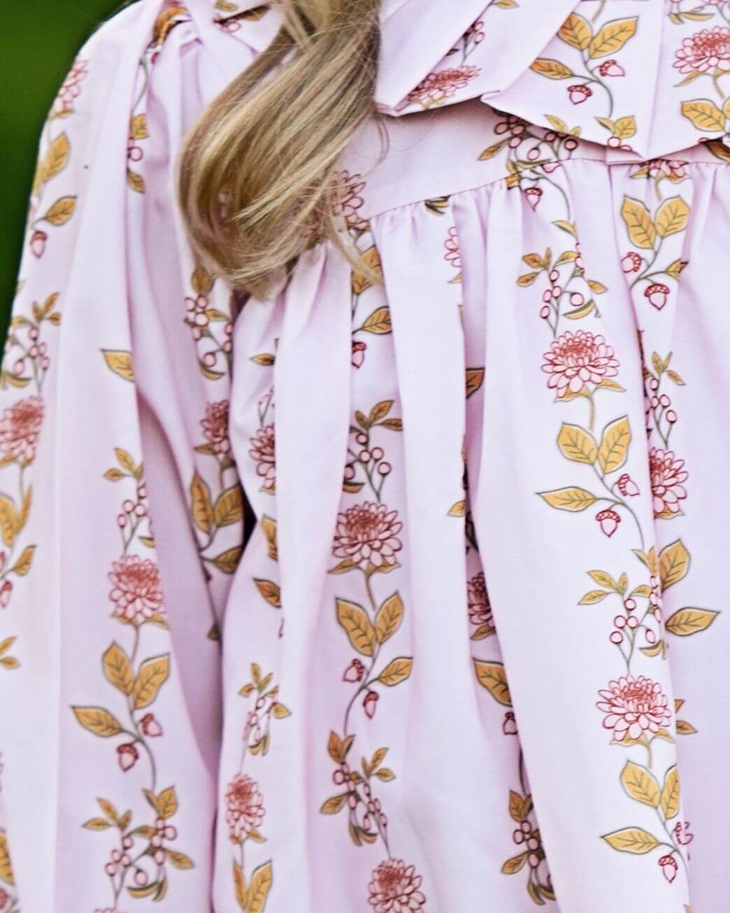 Floral-patterned garment with a focus on fabric texture and design.