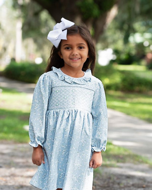 Girl wearing Blue Floral Corduroy Smocked Dress