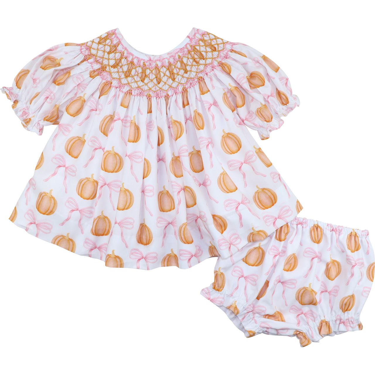 Diaper set featuring pumpkin and bow pattern on a white background