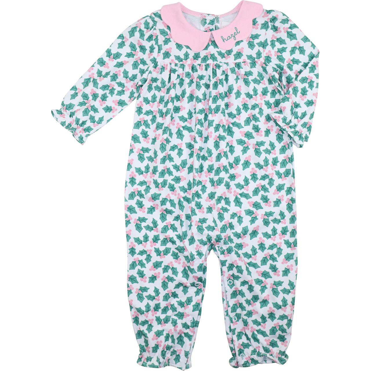 Baby onesie with holly leaf pattern on a white background