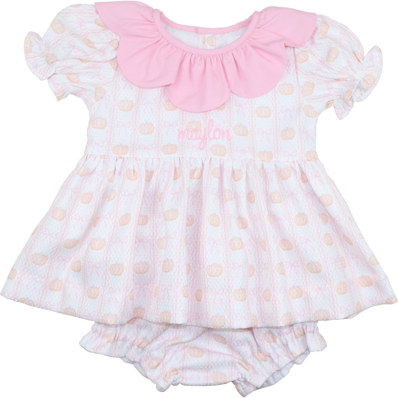Diaper set with pink collar and white pumpkin pattern on a white background