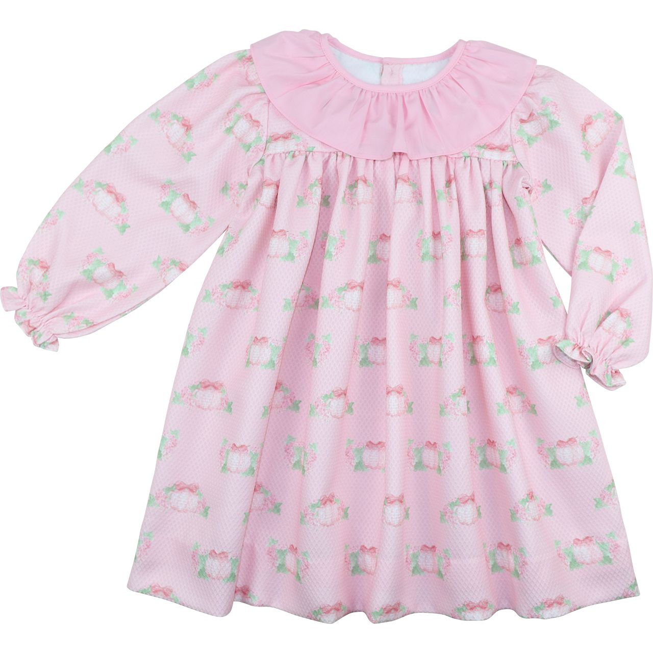 Pink dress with floral and pumpkin pattern on a white background