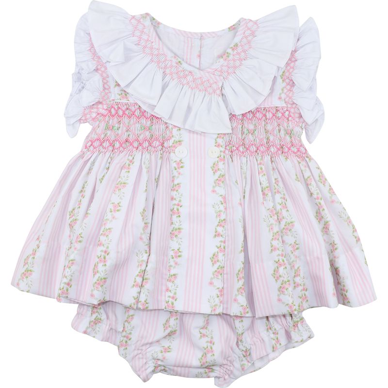 Floral baby dress with ruffled top on a white background