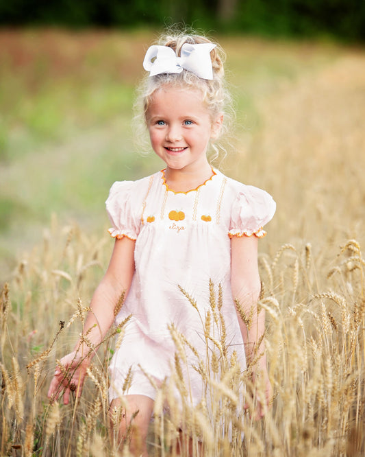 Pumpkin Dress on Little Girl in Field