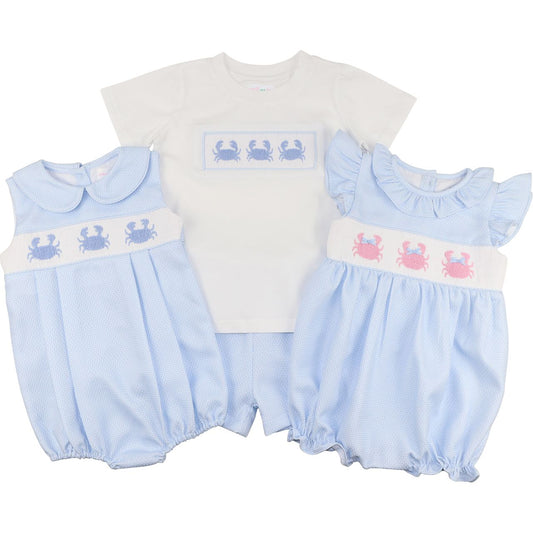 Set of baby rompers with crab design on a white background
