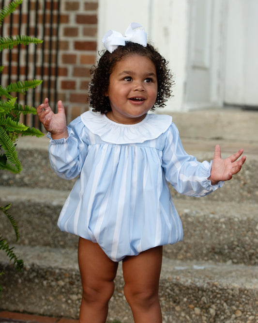 Young girl in Blue And White Striped Bubble