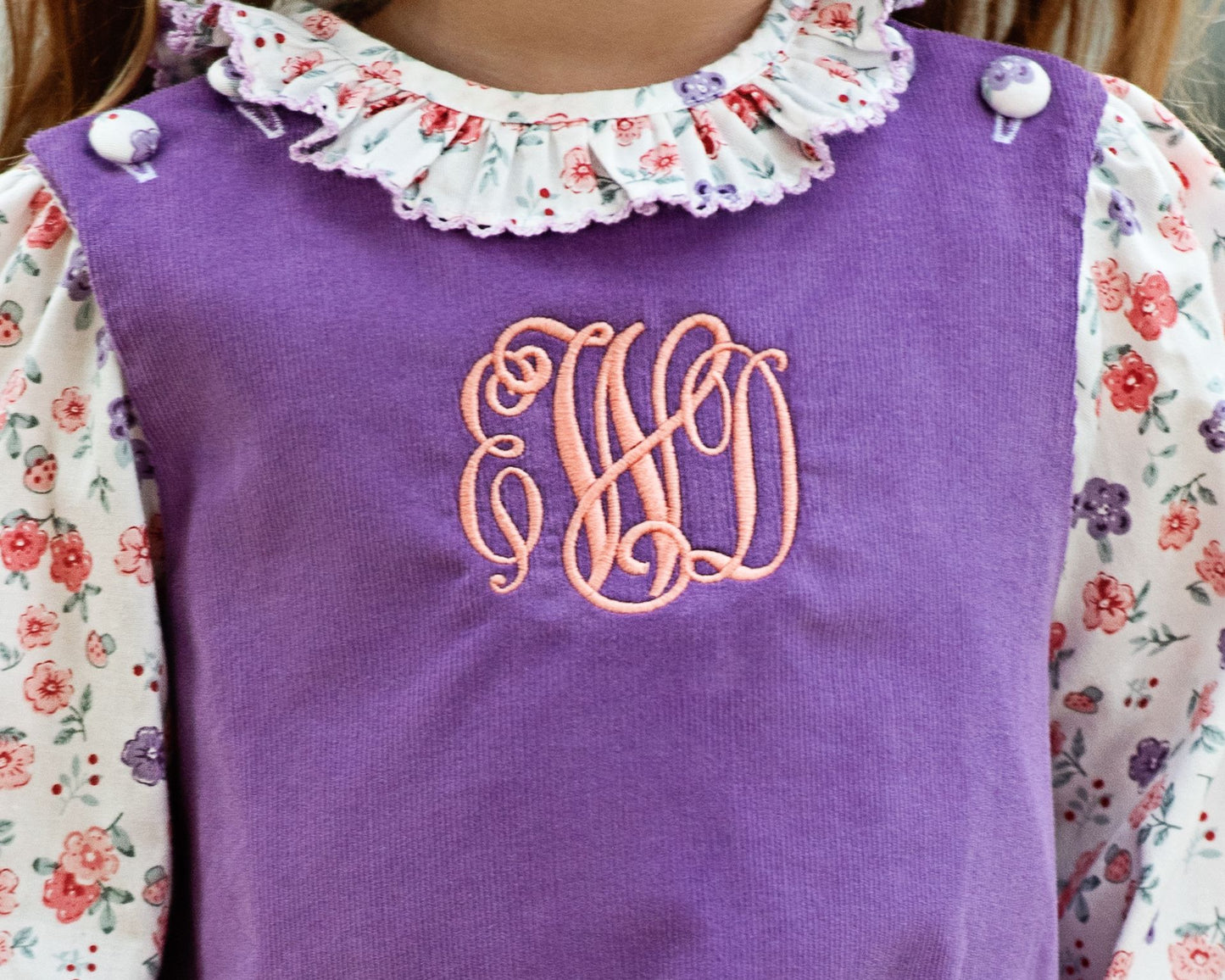close up purple floral bubble with monogram EWD