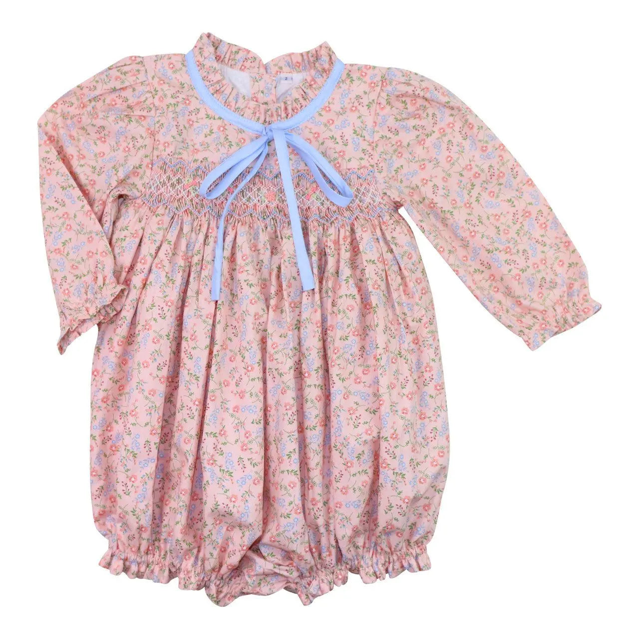Floral baby romper with long sleeves and a blue bow on a white background