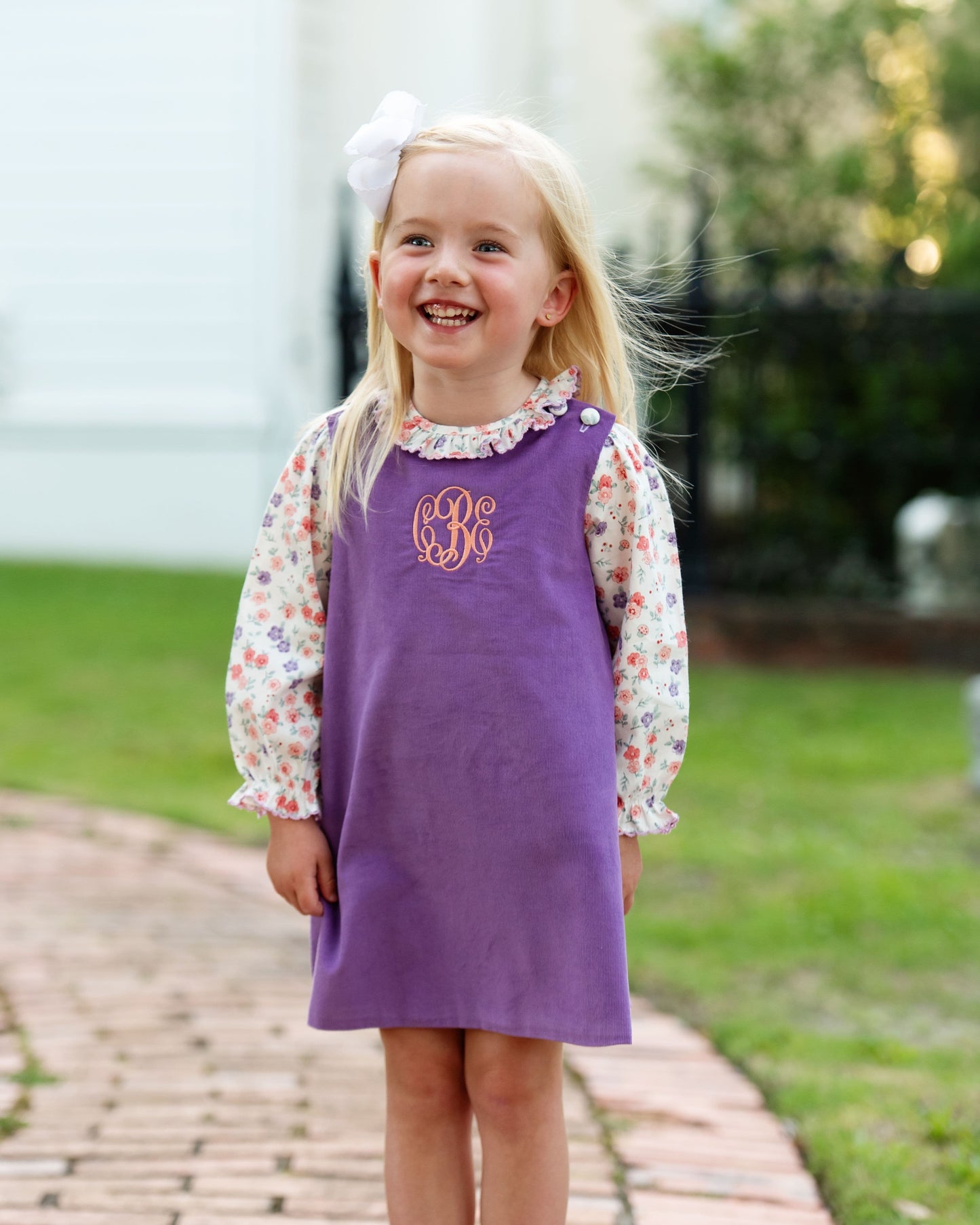 girl in purple floral dress monogram CBE
