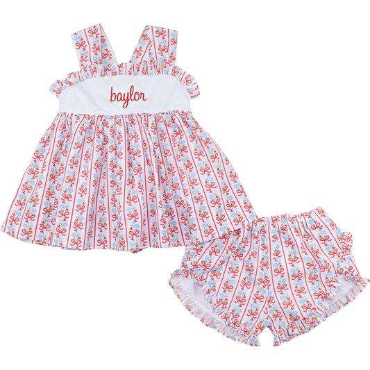 Children's short set with red and blue pattern on a white background