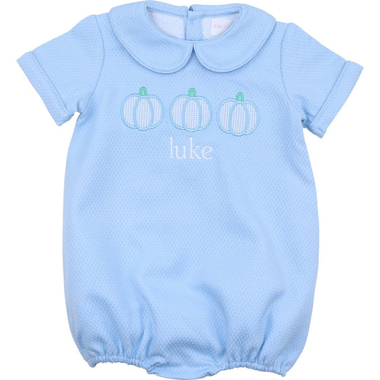 Light blue bubble with pumpkin design and 'luke' text on a white background