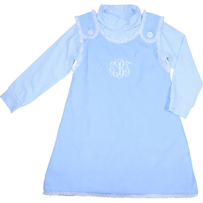 Blue corduroy jumper dress with blue gingham turtleneck and monogram detail