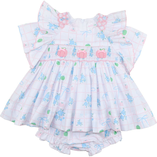diaper set with floral and pumpkin pattern and pink bow on a white background
