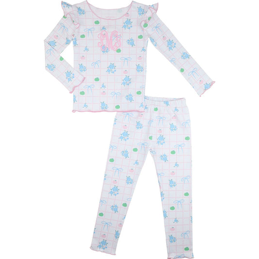 Children's pajama set with floral and pumpkin pattern on a white background