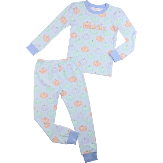 Boys pajama set with pumpkin pattern on a light blue background