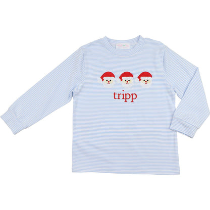 Light blue striped long-sleeve shirt with cartoon faces and 'tripp' text on a white background