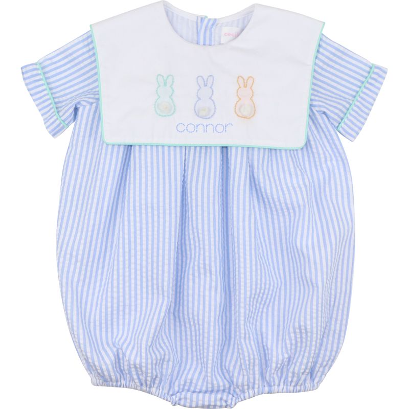 Baby bubble with blue and white striped pattern and embroidered bunnies on a white background