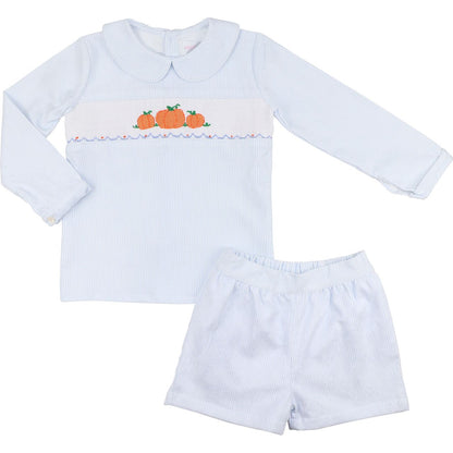 Boy outfit with long-sleeve top and shorts featuring embroidered pumpkins on a white background