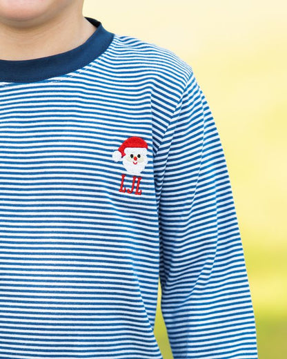 Blue and white striped shirt with a cartoon character on a yellow background