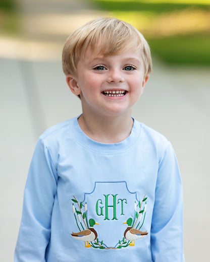 Boy wearing Blue Knit Embroidered Mallards Shirt
