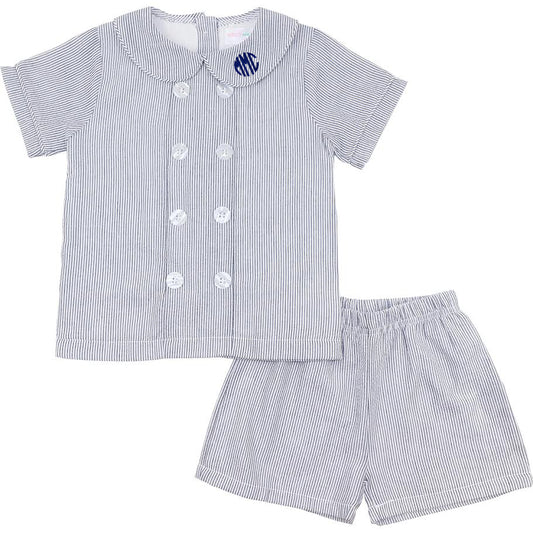 Children's blue and white striped shirt and shorts set on a white background