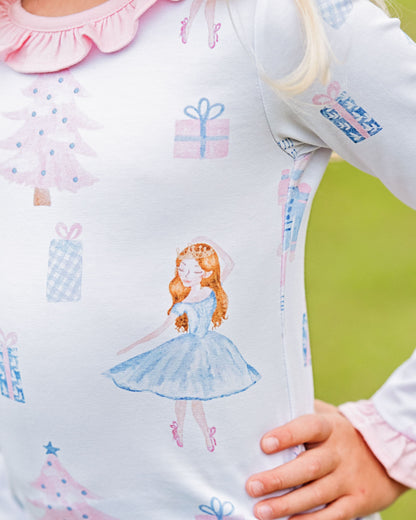Children's outfit with a fairy design on a light blue background