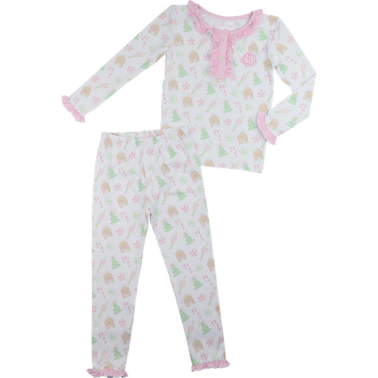 Children's pajama set with a pattern of trees and candy canes on a white background