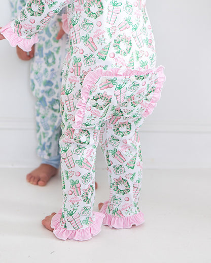Children's pajama set with festive pattern on a white background