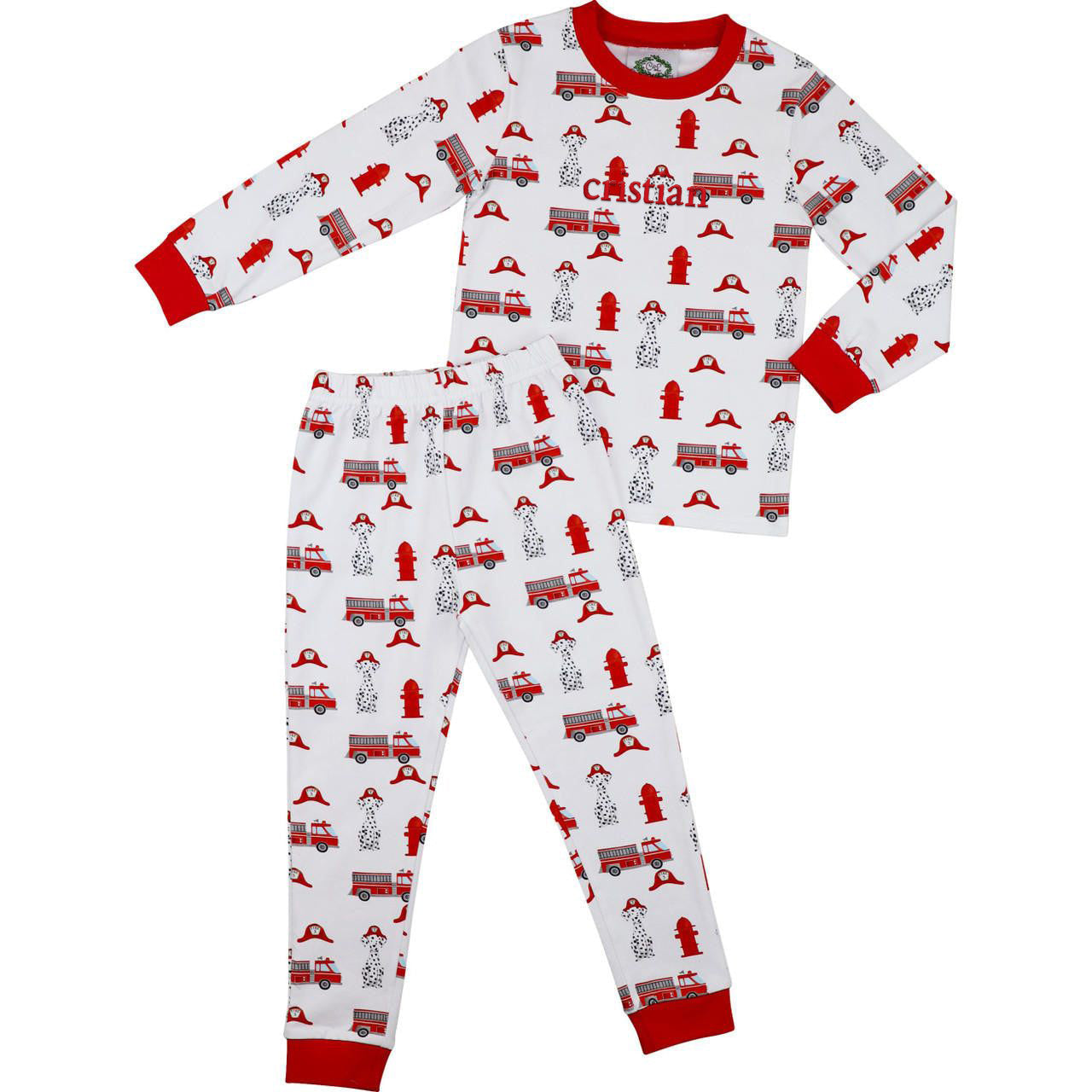Children's pajama set with fire truck and firefighter pattern on a white background