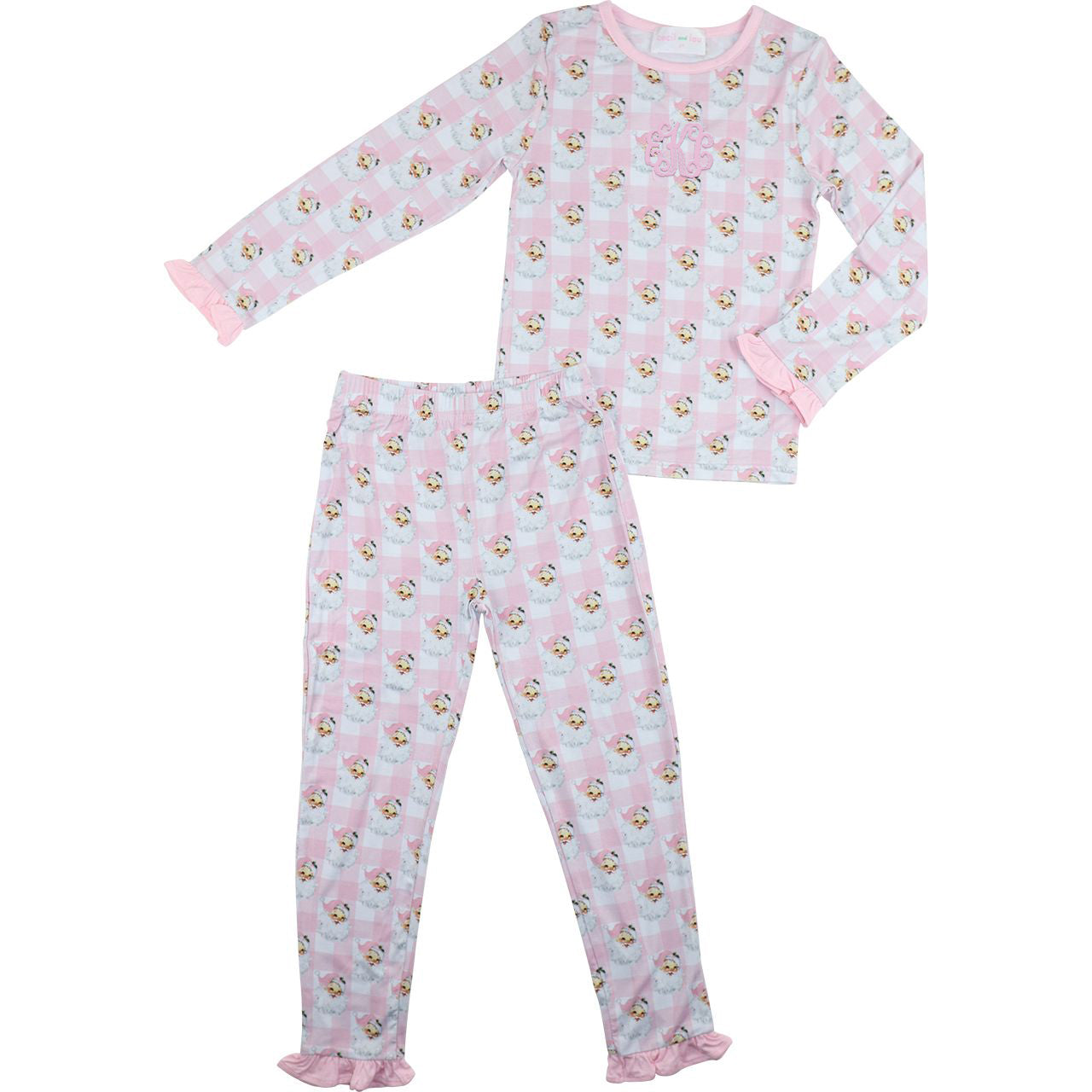 Children's pajama set with pink and white pattern and Santa faces on a white background