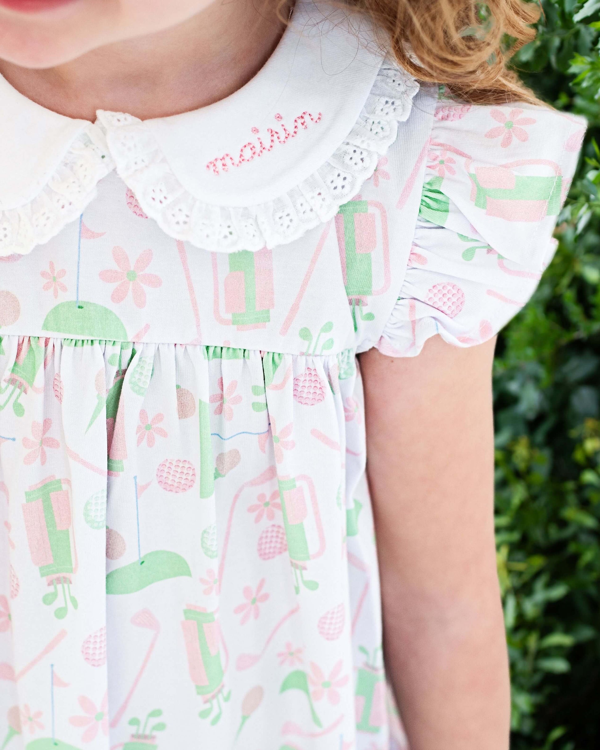 green and pink knit dress Andreeva CHRYSANTHEMUM GREEN KNIT DRESS WITH PINK FEATHERS DETAILS