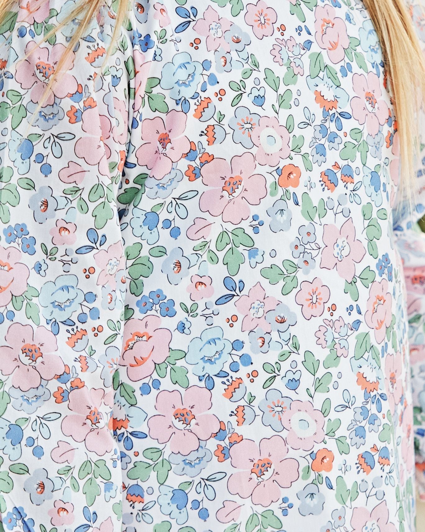 Close up of  Pink And Blue Floral Eyelet Legging Set