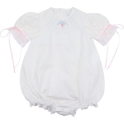 Girls white heirloom bubble romper, embroidered pastel bow, pink ribbon ties, lace trim, front view