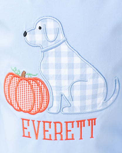Embroidered dog and pumpkin design with 'Everett' on a light blue background