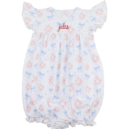 Baby bubble with floral pattern and 'jules' monogram on a white background