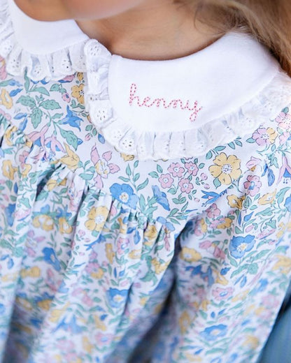 Floral dress with 'henny' embroidery on a white collar3