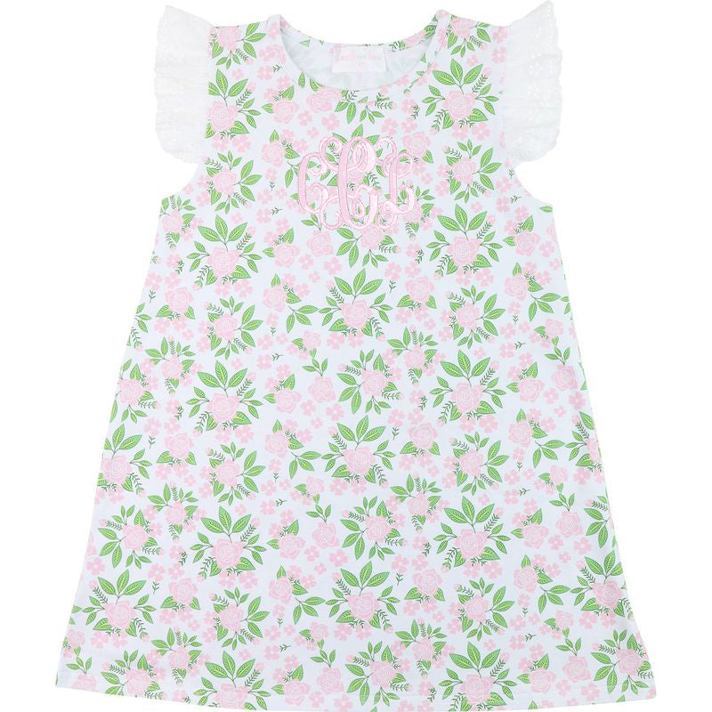 Floral dress with pink flowers and green leaves on a white background
