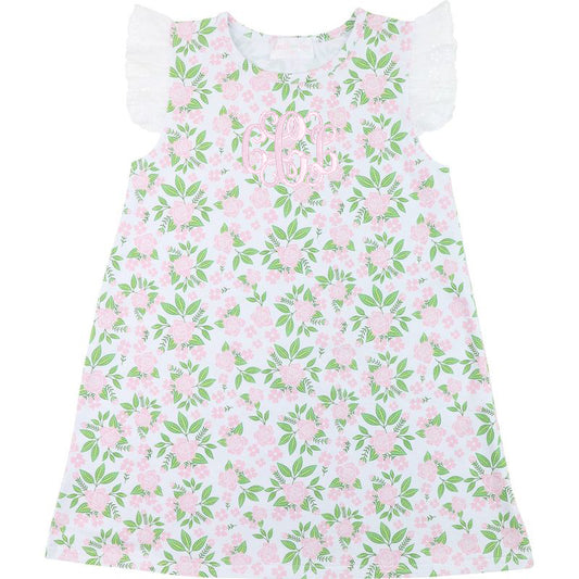 Floral dress with pink flowers and green leaves on a white background