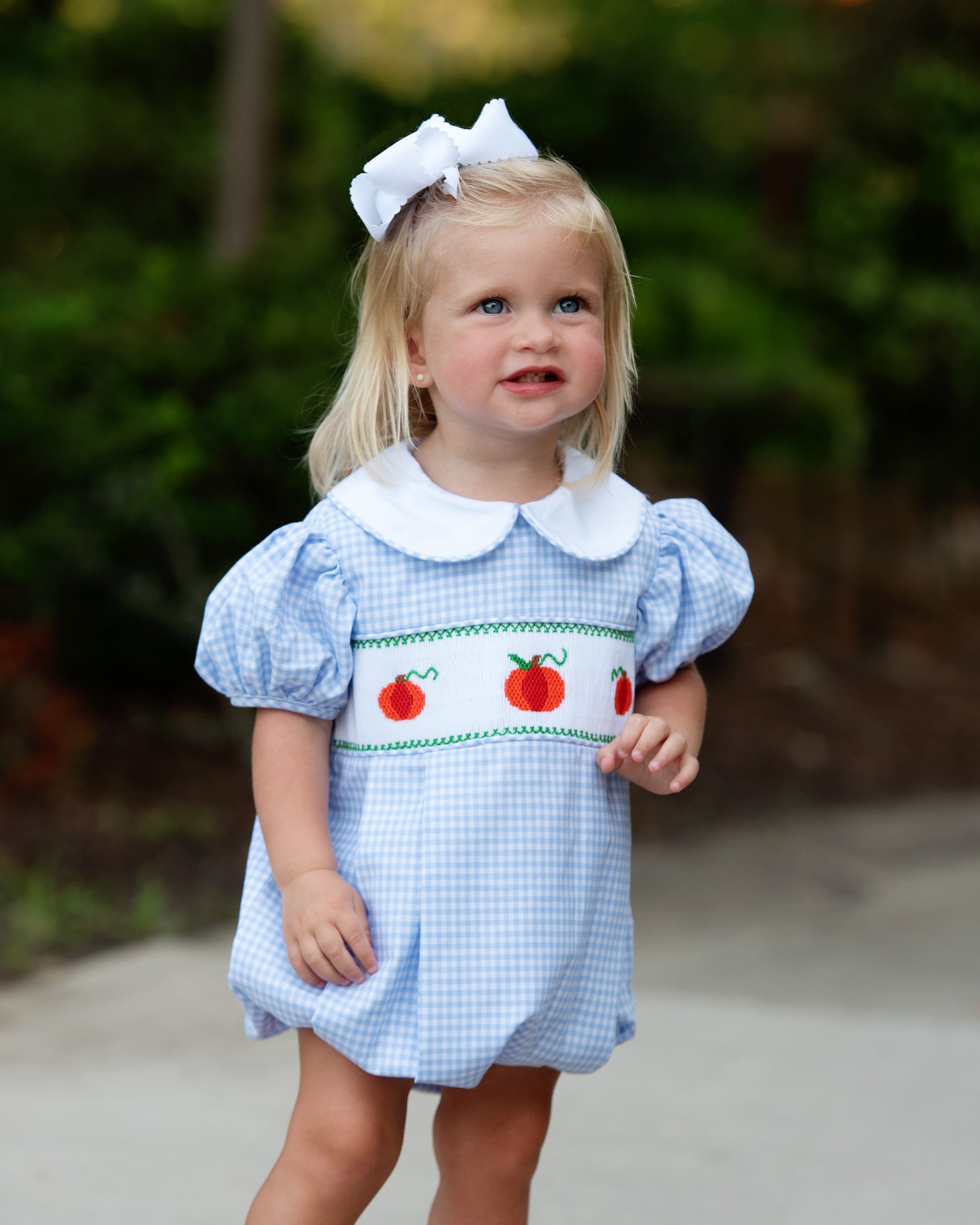 Girl in blue plaid pumpkin bubble
