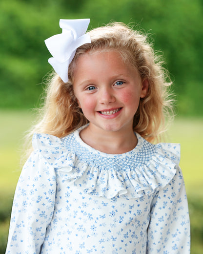 Girl wearing Blue Floral Corduroy Geometric Smocked Dress 