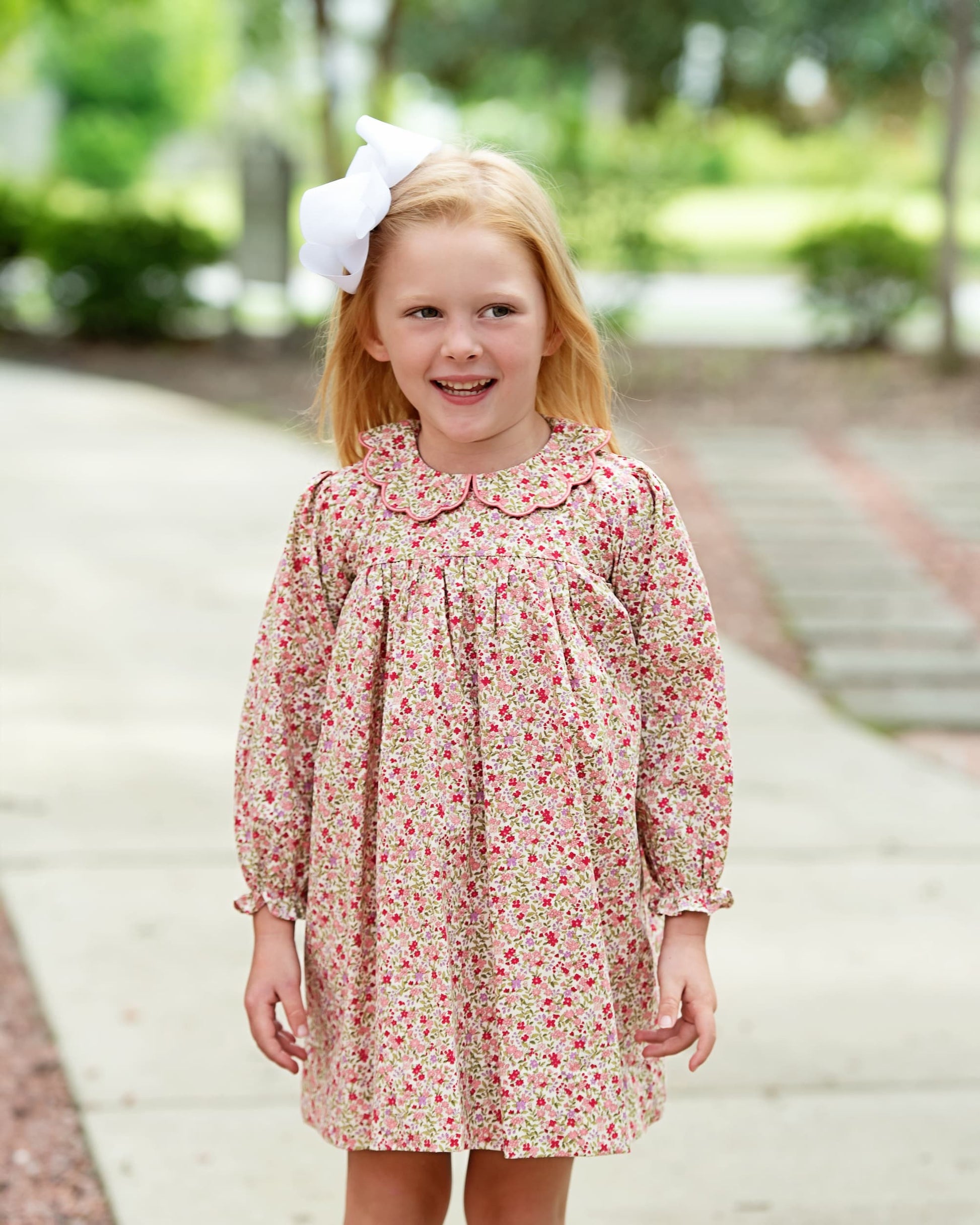 Girl wearing Pink Petite Floral Dress