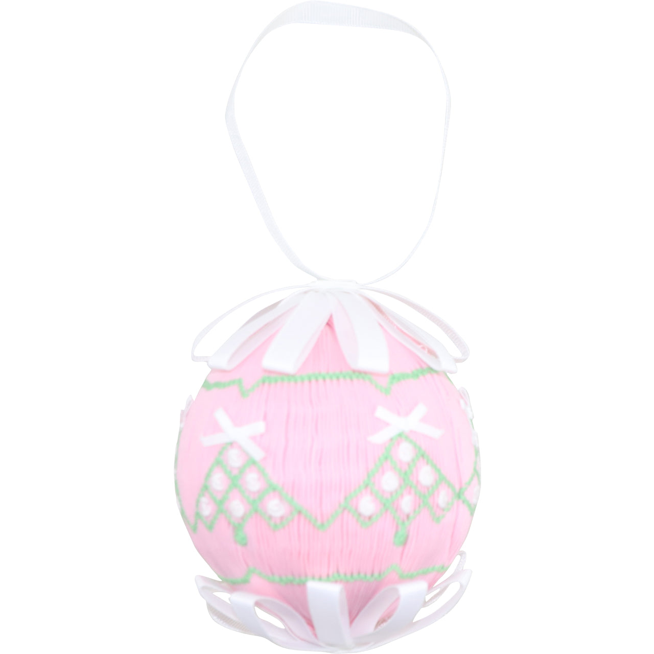 Pink smocked Christmas trees on an ornament on a white background